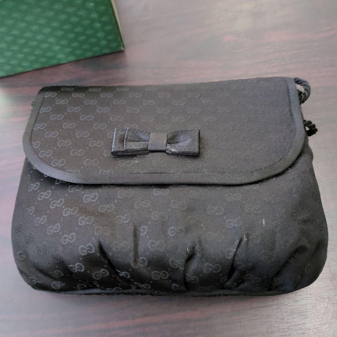 GUCCI ブラックポーチ リボン付き 中古・古着通販】GUCCI (グッチ) GGキャンバス アクセサリーポーチ