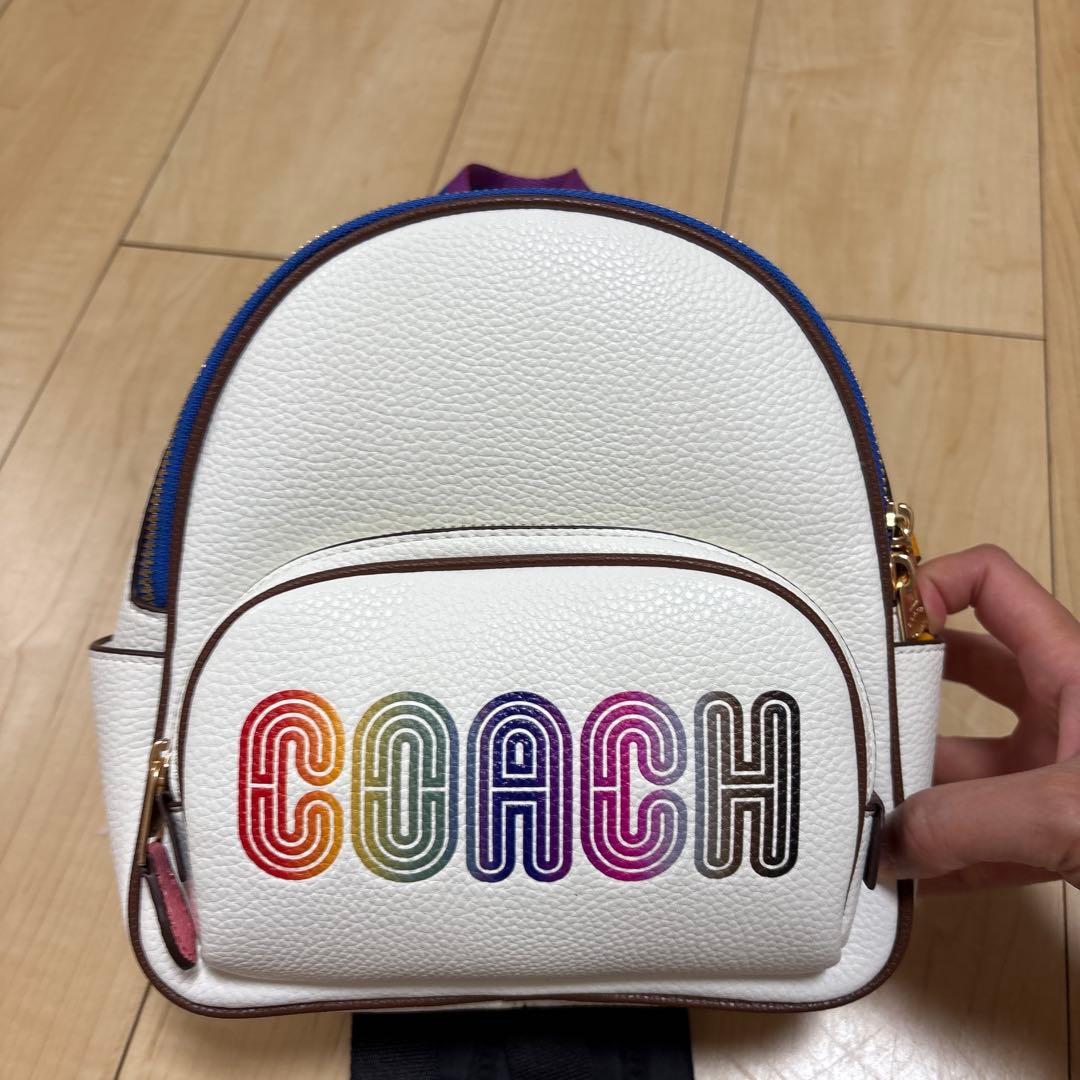 COACH カラフルロゴリュック